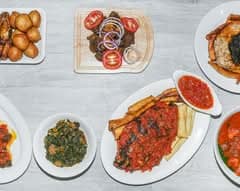 An assorted spread of Nigerian dishes for a catered event
